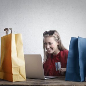 happy woman shopping online at home